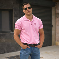 Man in Pink Polo shirt and jeans