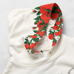 White oversize hoodie with roses on the hood